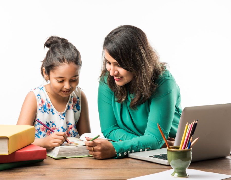 indian-girl-studying-with-mother-teacher-study-table-with-laptop-computer-books-having-fun-learning